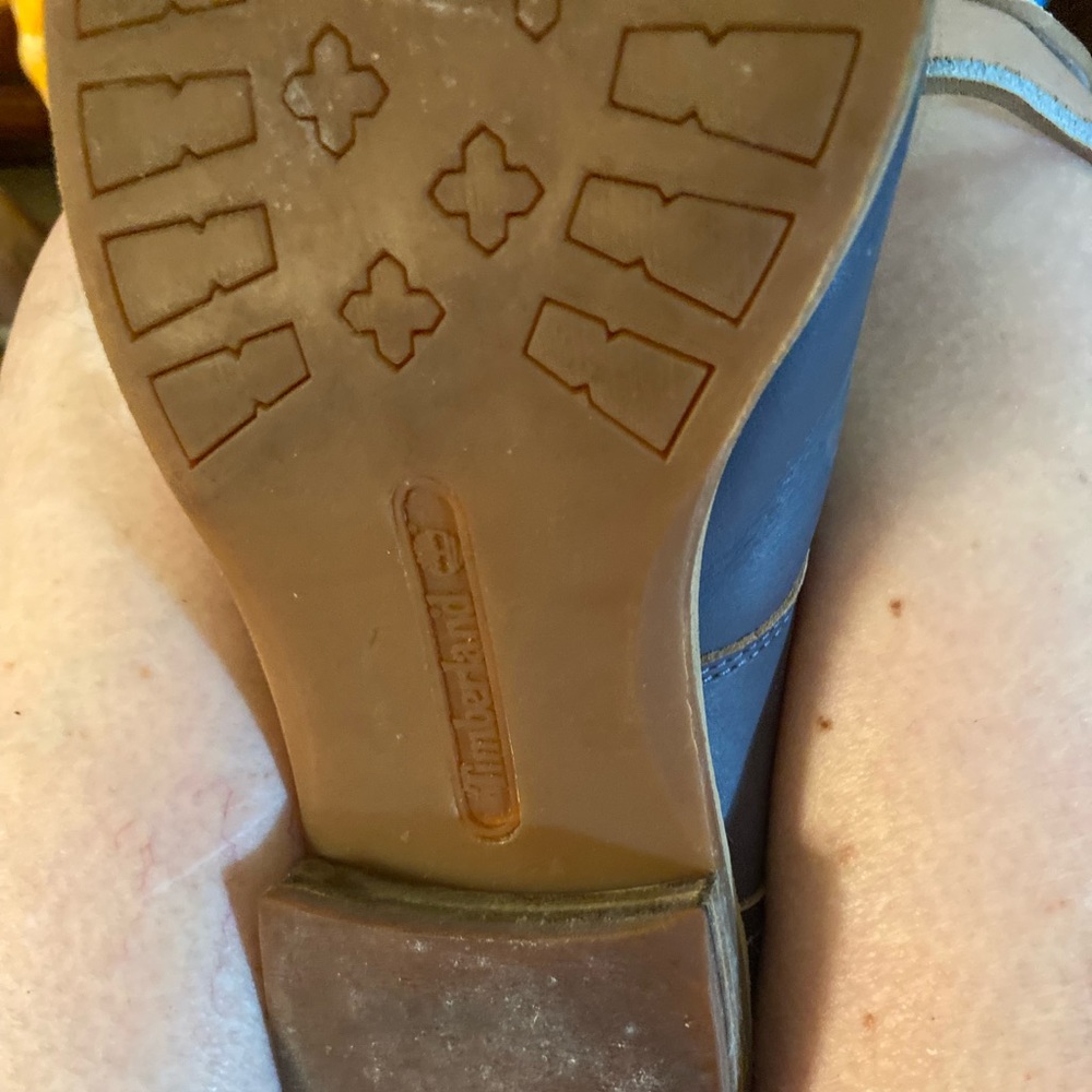 Blue leather boots time in front